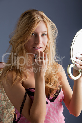 beautiful woman with mirror