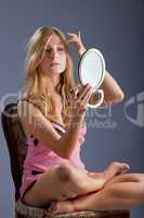 beautiful woman with mirror