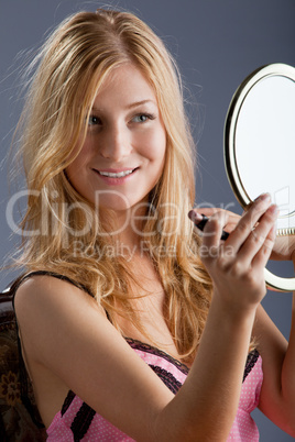 beautiful woman with mirror