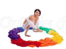 Woman doing yoga exercise - rainbow color ring