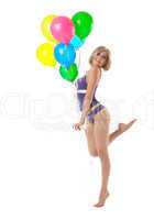 Beauty young woman in lingerie dance with balloons