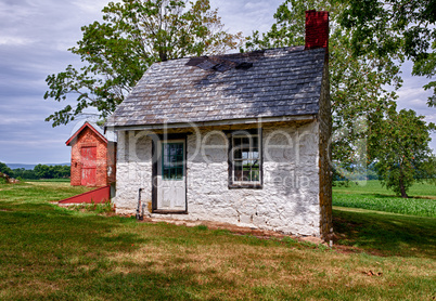 Old white house on farmland