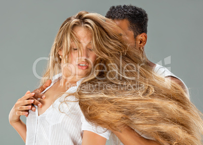 Young couple dances Caribbean Salsa