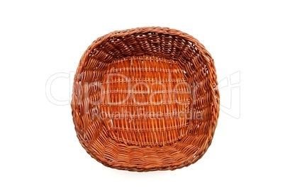 Brown wicker basket top view isolated