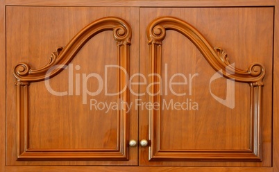 Wooden carved wardrobe doors closeup