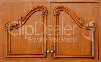 Wooden carved wardrobe doors closeup