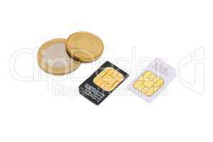 Two SIM cards for cellular phones and euro cents isolated