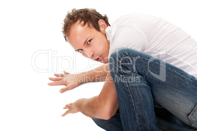 Portrait of young surprised man gesturing.