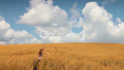 Woman in wheat field