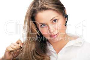 young beautiful business woman with headsetling