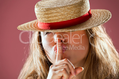 blond woman and straw bonnet