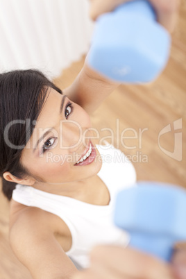 Beautiful Young Asian Chinese Woman Lifting Weights at Gym