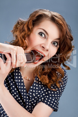 happy smiling woman eating chocolate