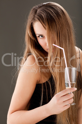 young woman with bocal of wine