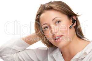 young beautiful business woman with headsetling