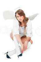 beautiful blonde angel against white background