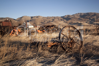 Old farm equipment in a field