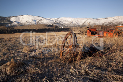 Old farm equipment in a field