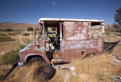 Old rusty abandoned car