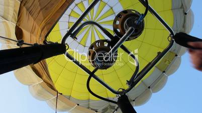 Short bursts of hot air balloon burner to keep going up