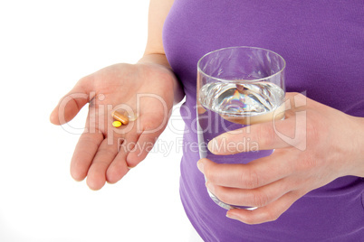 Tabletten und Glas