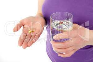 Tabletten und Glas