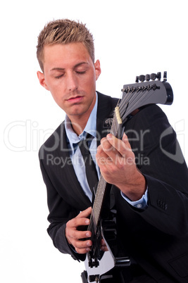 Young business man enjoying music