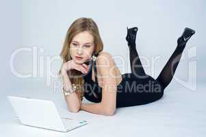 Attractive blonde girl with laptop