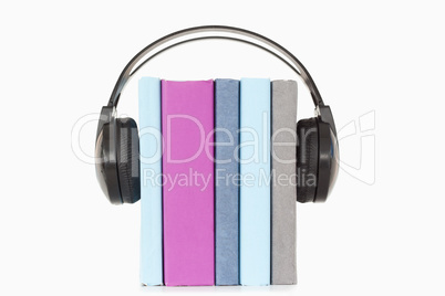 Close up of books and headphones