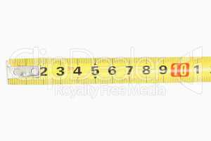 Close up of a yellow measuring tape