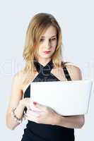 Attractive blonde girl with laptop