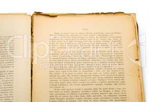 Open ancient book, isolated on white background