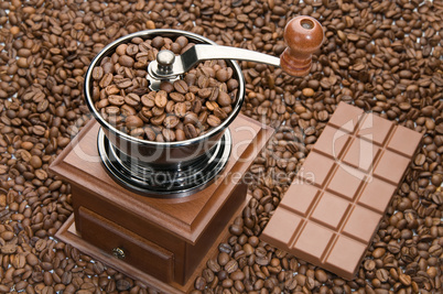 Old coffee grinder and Chocolate