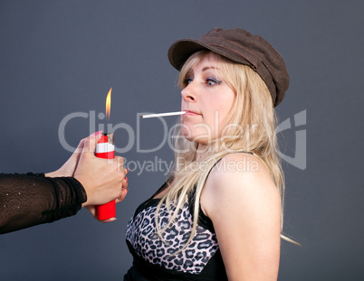 lighting a cigarette