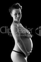 Beautiful pregnant woman in back & wite
