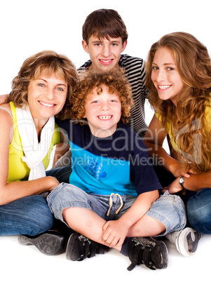 Happy young smiling family with two boys