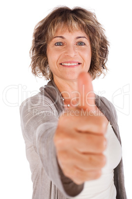 Senior woman gesturing thumbs-up