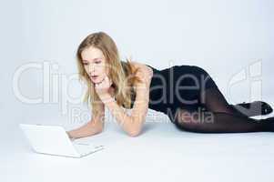 Attractive blonde girl with laptop