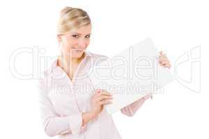 Happy businesswoman hold aside empty white banner