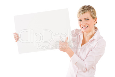 Happy businesswoman behind empty banner thumbs up