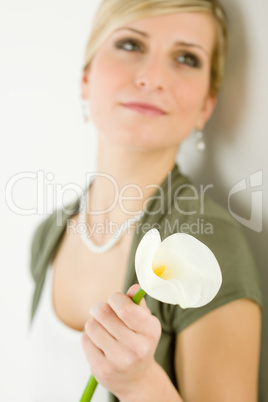 Calla lily flower romantic woman in background