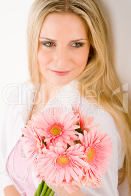 Romantic woman hold pink gerbera daisy