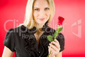 Elegant woman hold red rose