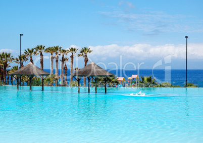 Swimming pool with jacuzzi and beach of luxury hotel, Tenerife i