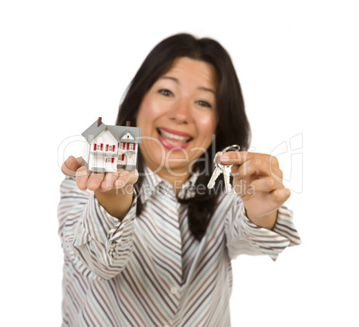 Attractive Multiethnic Woman Holding Small House and Keys