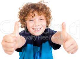 Smilling cute little boy gesturing thumbs up