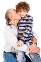 Grandson kissing his grandfather
