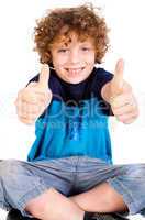 Young kid showing double thumbs up