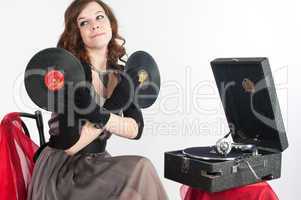 Beautiful woman with gramophone,