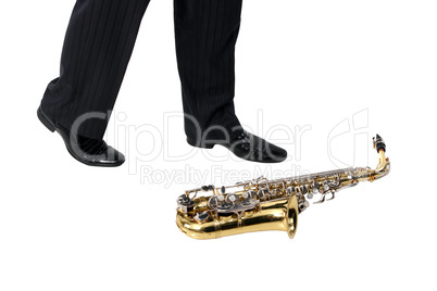 Sax on the floor, men's foot